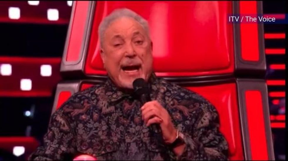 Tom Jones, 85, halts Cardiff gig as he addresses controversy over song while crowds boo decision to ban